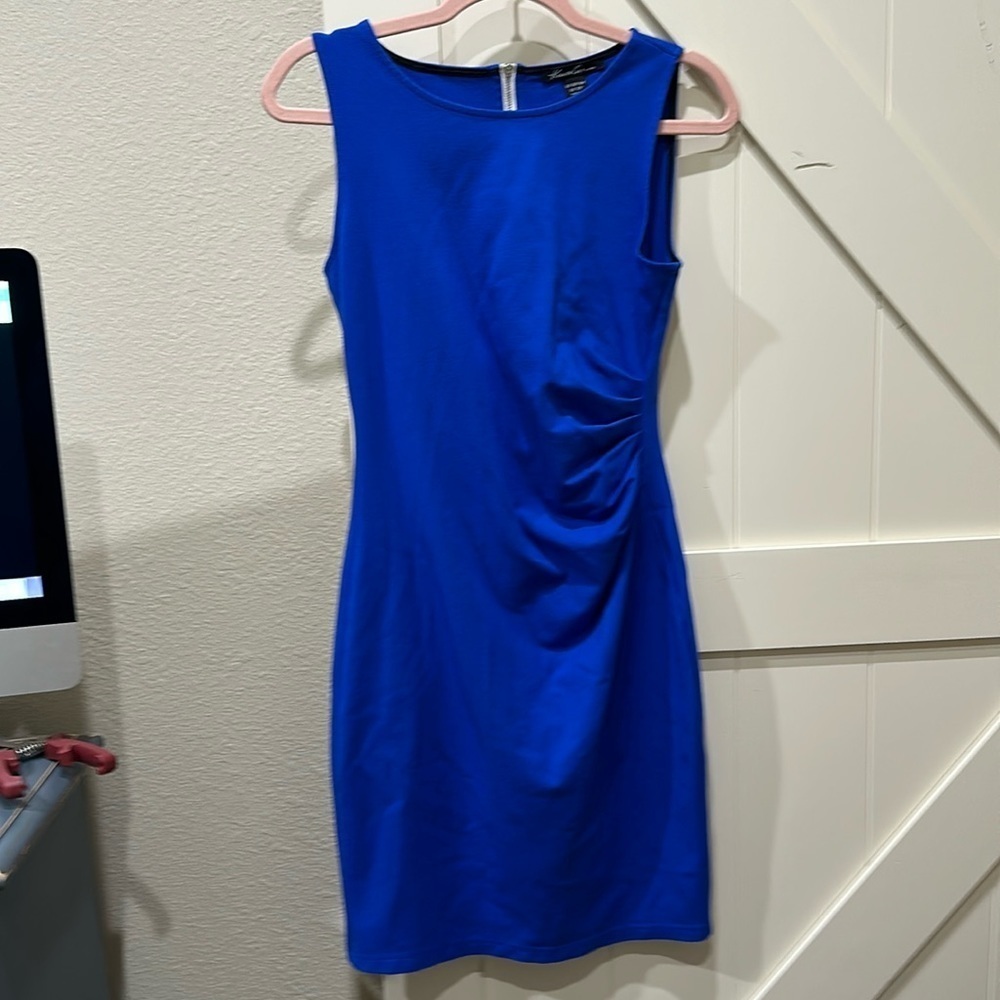 Beautiful Kenneth Cole Royal blue dress with zipper in back all the down. Love